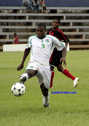 buffaloesvszanaco1 Green Buffaloes' Brian Chilando tries to stop the ball during the KCM-FAZ mid-week match played at Woodlands stadium