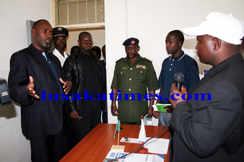 npps1 Northern Province permanent secretary Mwalimu Simfukwe (r) talks to Zambia National Union of Teachers officials during the official opening of the Pensions Fund Board office at Compensation offices in Kasama