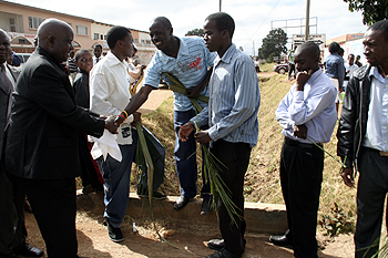 palm6 Dr Kaunda greeting children when he arrived for palm sunday at Kamwala RCZ church