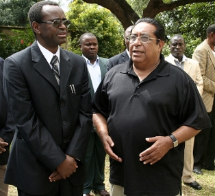 vp_at_funeral_house Vice president George Kunda talks to Ibrahim Malik, brother-in-law to the late Lands deputy minister Nasim-Ul-Gani Hamir when he visited the late Hamir’s funeral house in Lusaka