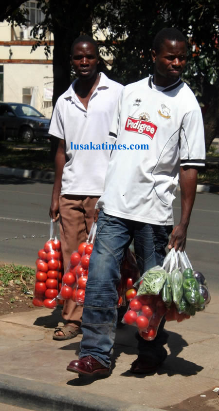 Hawkers peddling vegetables on the streets in Lusaka Hawkers peddling vegetables on the streets in Lusaka
