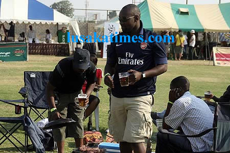 Fat People Drinking Beer. 11. People preparing barbique