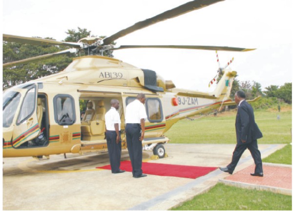 President Sata about to board the Presidential helicopter at State House yesterday morning before departure for India President Sata about to board the Presidential helicopter at State House yesterday morning before departure for India