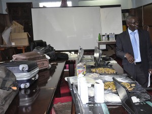 DRUG Enforcement Commission (DEC) public relations officer Samuel Silomba looks at the exhibit of the largest single seizure of cocaine weighing 13.2 kilogrammes. Among other items seized were DVD players and baby powder containers where the drugs were concealed