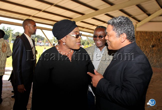 Foreign Affairs and Tourism Minister Given Lubinda chats with former First Lady vera Chiluba