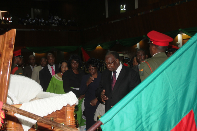 Justice Sakala paying last respects