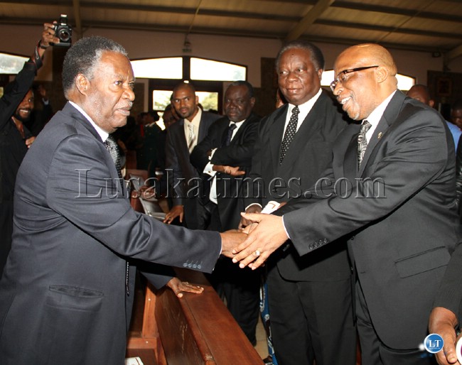 President Sata shakes hands with MMD presidential aspirant Dr Nevers Mumba