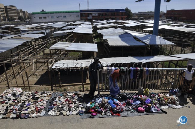 Some traders at the donchi kubeba market, which is located under the Kafue road fly over bridge in Lusaka