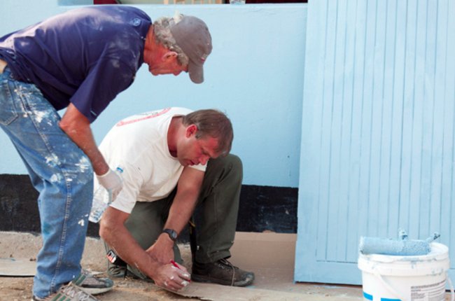 President George W. Bush and Timothy Keller, an American Missionary working in Zambia, take a moment during renovations of the Ngungu Health Center in Kabwe, Zambia, to discuss and draw out a strategy on Monday, July 2, 2012. Photo by Shealah Craighead President George W. Bush and Timothy Keller, an American Missionary working in Zambia, take a moment during renovations of the Ngungu Health Center in Kabwe, Zambia, to discuss and draw out a strategy on Monday, July 2, 2012. Photo by Shealah Craighead