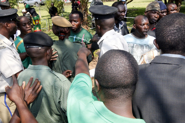 PF cadres during their attack on UPND members at the Cathedral of the Holy Cross in Lusaka. PF cadres during their attack on UPND members at the Cathedral of the Holy Cross in Lusaka.