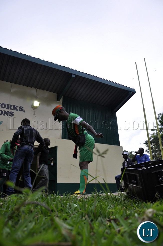 A soccer fan dancing before the Zambia-Bukina Faso match in Lusaka.