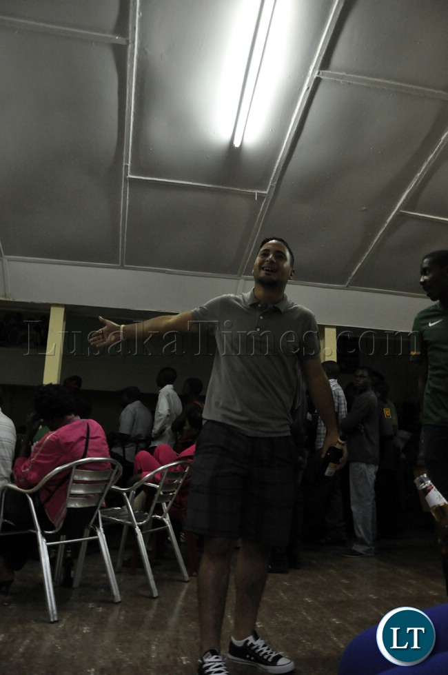 A soccer fan reacts after Zambia missed scoring opportunities during the match against Bukina Faso