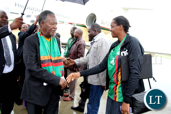 President Michael Sata greets the Zambia official on arrival in Nelspruit, South Africa where President Sata addressed the National Team players