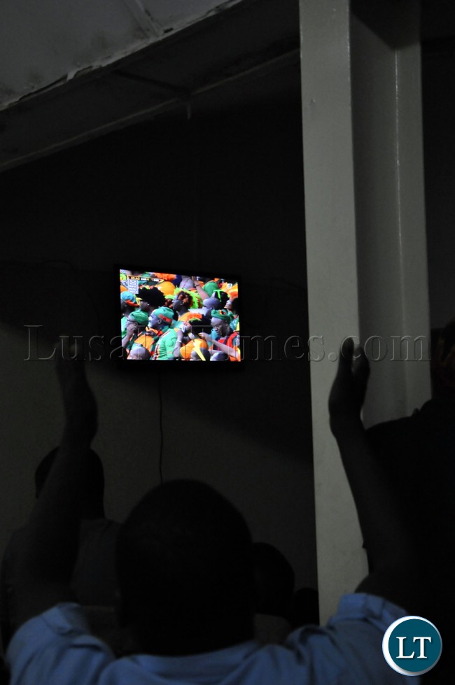 Soccer fans watching proceedings of the Zambia Bukina Faso match
