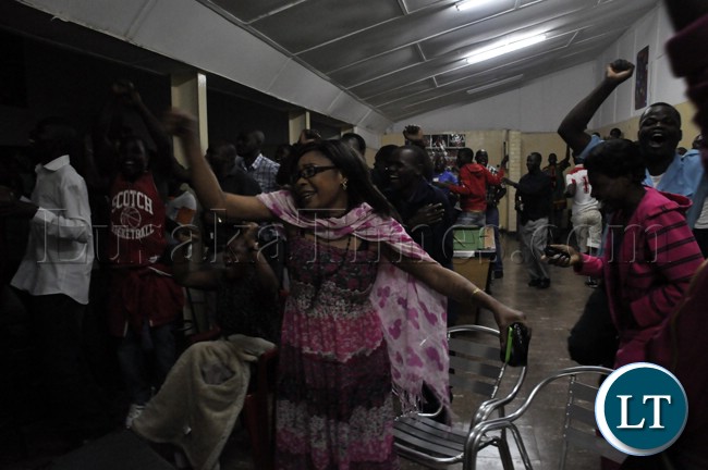 Some soccer fans cheering the Chipolopolo during the Zambia versus Bukina Faso match in Lusaka.
