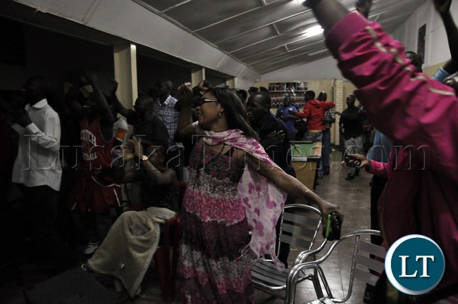 Some soccer fans cheering the Chipolopolo during the Zambia versus Bukina Faso match in Lusaka