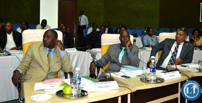 Rufunsa MP Kenneth Chipungu, Kanyama MP Gerry Chanda and Kabwata MP Given Lubinda follow the proceedings of the Constitution meeting at Mulungushi International Conference Centre in Lusaka