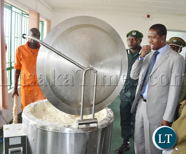 Home Affairs Minister Edgar Lungu tastes nshima prepared by inmates shortly after commissioning the newly built Mwembeshi Maximum security prison in Mumbwa district