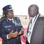 Inspector General of Police Stella Libongani speaks with Tourism Permanent secretary George Zulu shortly before President Michael Sata arrived at Harry Mwaanga Nkumbula International Airport for the opening of the UNWTO 20th General Assembly -Picture and caption by THOMAS NSAMA