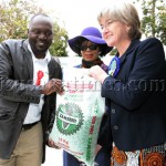 Wife of Vice President Guy Scott, Charlotte, receives maize seed from
Zamseed Sales Officer Kalutwa Kalunga (left) when she toured stands
and pavilions at the Zambia Agriculture and Commercial Show in Lusaka.