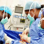First Lady Dr Christine Kaseba conducts an operation at Mkushi General Hospital where she is offering medical Services on September 10,2013-Picture by THOMAS NSAMA