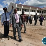 Education deputy minister Professor Neverlyn Wilombe
inspecting the on-going construction works at Robert Makasa University
in Chinsali Muchinga Province. Government has engaged Flame
Construction Company to carry out the works which are now are 98
percent complete