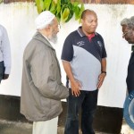 NATIONAL Sports Council of Zambia (NSCZ) chairperson Mwamba
Kalenga (right), NSCZ board member Haroon Ghumra (third from right)
and NSCZ acting general secretary Man Muchimba (right) consoling
veteran soccer commentator and broadcaster Dennis Liwewe’s son Ponga
at the funeral house in Lusaka