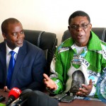 Lusaka Province Patriotic Front Chairman Geoffrey Chumbwe (right) speaking to
journalists as his Copperbelt counterpart Stardy Mwale looks on