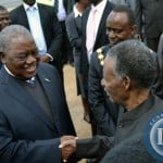 President Michael Sata shakes hands with former Republican president
Rupiah Banda at the commemoration of Africa Freedom Day at the freedom
statue in Lusaka