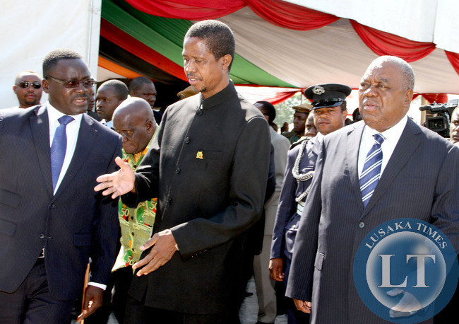 Acting President Edgar Lungu with former president Rupiah Banda (r) and acting Chief of Protocol Humphrey  Chibanda (l)  on arrival at Freedom Statue during the Golden Jubilee celebrations in Lusaka on October 24,2014  -Picture by THOMAS NSAMA