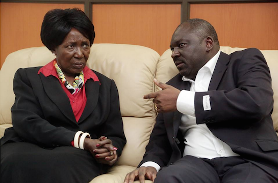 Vice President Inonge Wina and PF Secretary general Davies Chama confer
