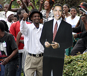 obamaplacard A man in Lusaka shows off his Barack Obama placard