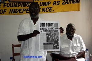 UNIP president Tilyenji Kaunda with his deputy Njekwa Anamela (r) lauching the party's publication in Lusaka recently 