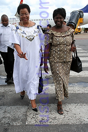 Mrs Graca Machel and ministry of Justice permanent secretary Getrude Imbwae at Lusaka international airport