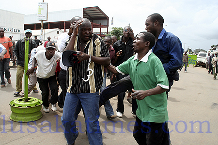 AN instant justice mob mating out punishiment on a man suspected of pickpocketing along Freedom Way in Lusaka