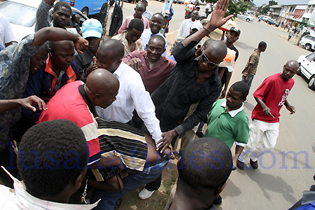 Suspected thief being beaten