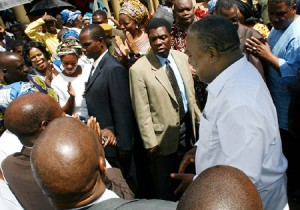 President Rupiah Banda interacts with MMD cadres who gathered outside State House in support of MMD National Executive Committee members in Lusaka yesterday