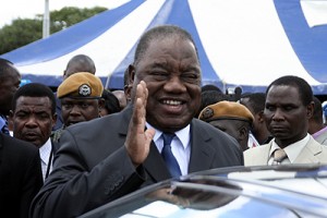 President Rupiah Banda bids farewell after officiating at the international women's day activities in Lusaka