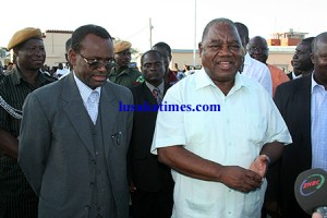 President Rupiah Banda flanked by his vice George Kunda talks to reporters when he arrived from North western province at Lusaka City airport.