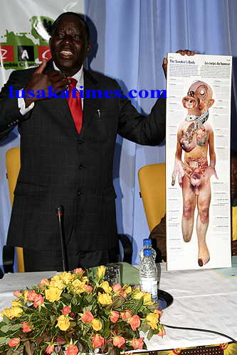 FILE: Health deputy minister Mwendoi Akakandelwa displays a placard on the effects of smoking during the launch of the smoke free Lusaka campaign