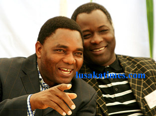 UPND president Hakainde Hichilema (L)