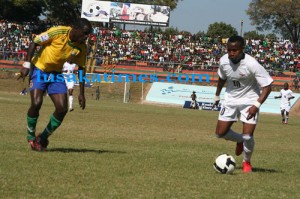 Zambia Felix Katongo (r) plots his move against Rwanda's Patrick Mafisango during the 2010 world cup qualifier match played at Konkola Stadium in Chililabombwe. Zambia won