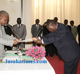 ACC_Director_General_Godfrey_Kayukwa Anti-Corruption Commission Director General Godfrey Kayukwa presents his oath papers to President Rupiah Banda after he was sworn in at State House recently