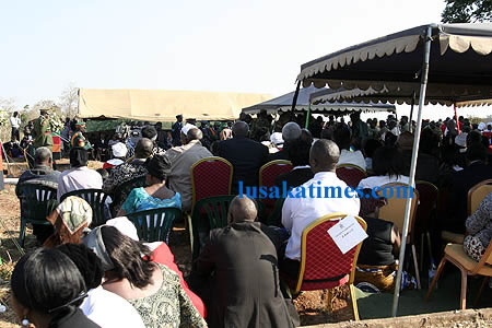 Mourners listening to speeches during the late John Mwanakatwe's burial