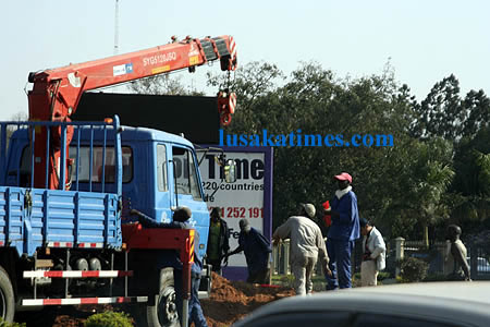 A team of construction workers mending the road at the Addis Ababa round about in Lusaka