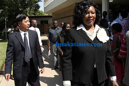 Education minister Dora Siliya, trailed by Chinese Ambassador to Zambia Li Quiangmin after the send off ceremony for 43 Zambians who received scholarships from the Chinese government.
