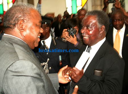 President Banda and PF leader Michael Sata greeting each other during the memorial service the late Levy Mwanawasa