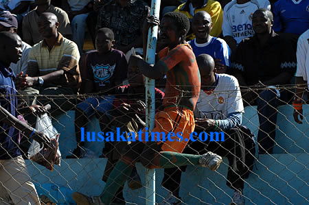 An irate fan trying jump the wire fence during the Zesco El Merreikh match at Nkoloma stadium