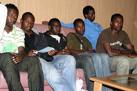 Defeated... National soccer team players on their arrival from Algeria at Lusaka international airport