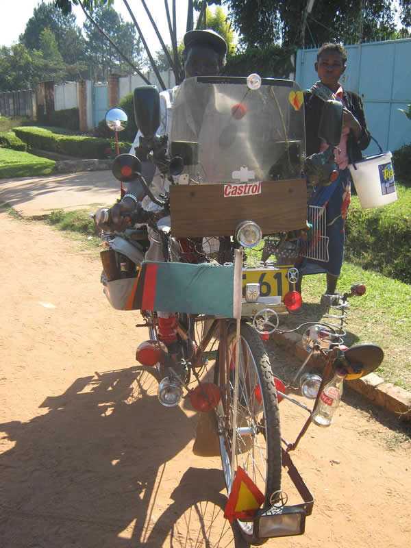 Picture Sent in by Blogger: Modernised bicycle-A man  captured in Parklands area in Kitwe  on his bicycle that is improvised  beyond imagination